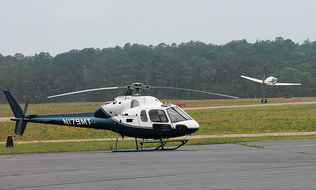 Helicopter traffic at East Hampton Airport cannot be curtailed at the moment, since the FAA contributed money toward infrastructure improvements there, and FAA rules prohibit any discrimination against certain types of aircraft. (Credit: Kyril Bromley/The East Hampton Press)
