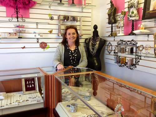 RACHEL YOUNG PHOTO | Glitzee Gal Creations owner Linda Stavrinos at her Mattituck shop.