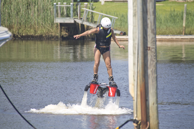 Maria Loja of Queens tries the Flyboard for the first time. (Credit: Paul Squire)