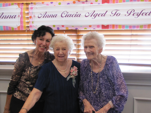 TIM GANNON PHOTO | Anna Ciacia, center, with daughter Maryann D'Augusta, left, and longtime friend Irene Kubiak, right, at Saturday's early birthday party for Ms. Ciacia, who will turn 100 on Oct. 6. 