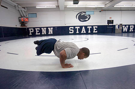 ROHAN MURPHY COURTESY PHOTO | Rohan Murphy does pushups in the weight room at Penn State, where he wrestled from 2004 to 2006.