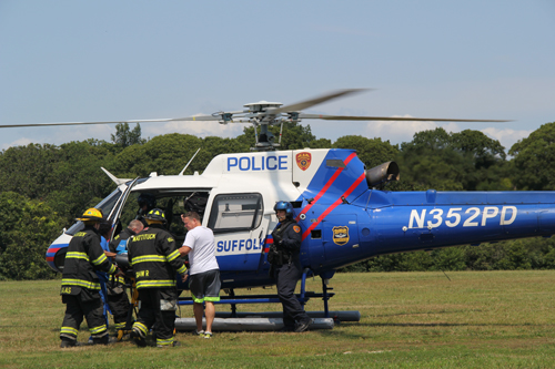 A child was airlifted Friday afternoon from the strawberry fields in Mattituck. (Credit: Joseph Pinciaro).