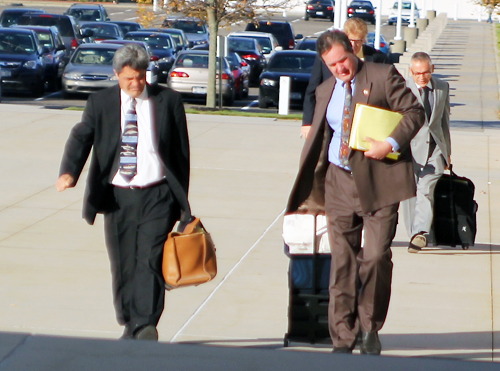 Former Mattituck teacher Anthony Claudio (right) entering the federal courthouse in Central Islip in October 2012 with his attorney, Frank Blangiardo. (Credit: Jennifer Gustavson, file)