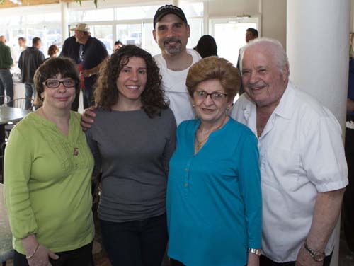 Fundraiser organizer (from left) Debbie Volinski and Hellenic owners Maria, George, Anna and John Giannaris. (Credit: Katharine Schroeder)