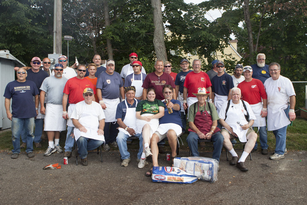 The men (and woman) who cook the chicken. (Credit: Katharine Schroeder)