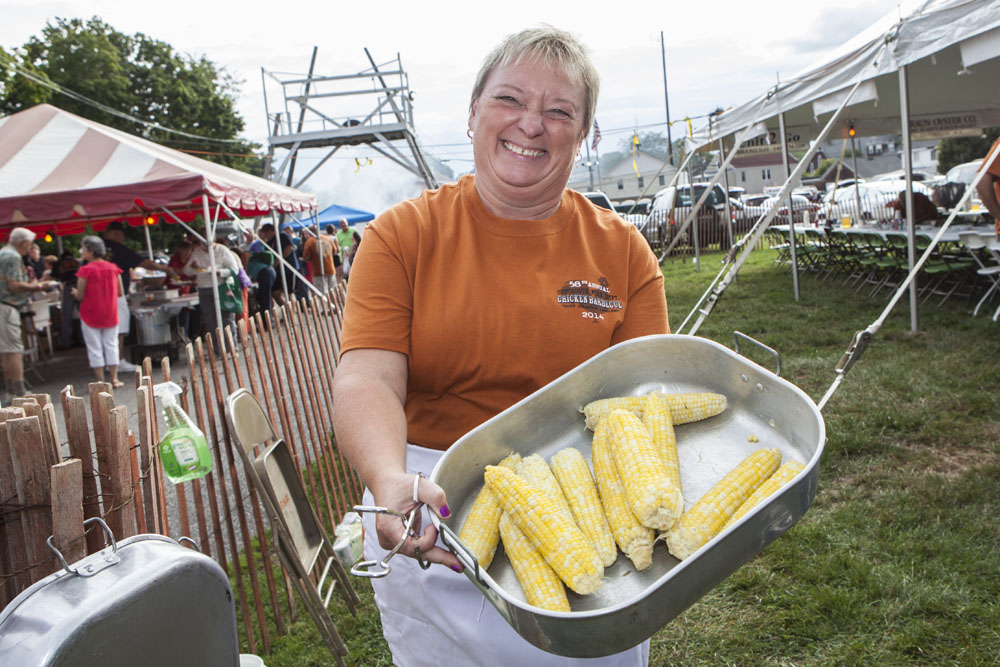 Catherine Pearsall shows off the fresh corn. (Credit: Katharine Schroeder)