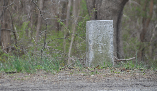 This mile marker in Mattituck marks 10 miles to the Suffolk County Courthouse. (Credit: Grant Parpan)