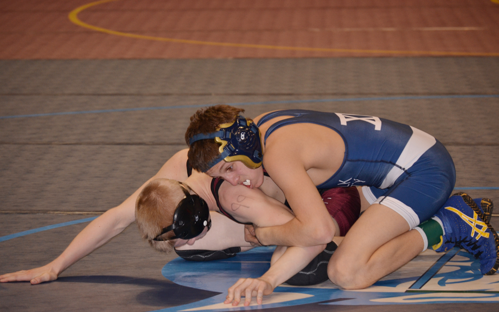 Jack Bokina of Mattituck wrestles in the quarterfinals of the state tournament Friday. (Credit: Paul Wager)