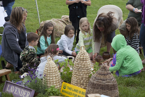 Children learn about herbs at Hallockville Museum Farm Saturday. (Credit: Katharine Schroeder)