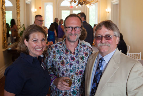 From left, Tall Ships Challenge manager Erin Short with David Nyce and Greenport Village Mayor George Hubbard.