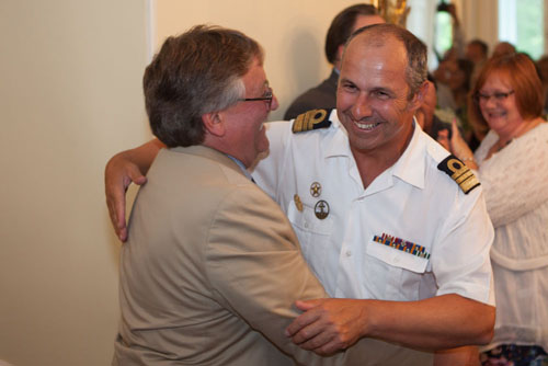 Paulo Portugal, Commanding Officer of Sagres embraces Mayor Hubbard.