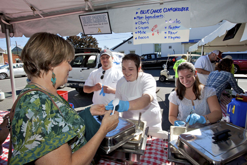 The crew from the Blue Canoe hands out chowder during the 2012 festival. (Credit: Katharine Schroeder file)