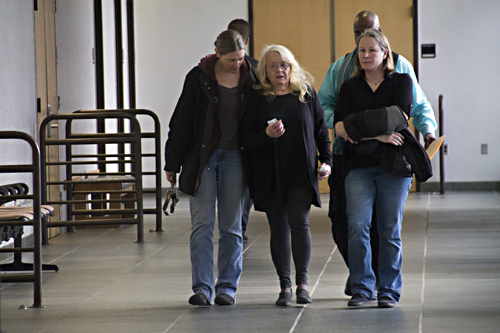 Christine Stulsky, center, walks out of court after being released on bond last month. (Credit: Paul Squire)