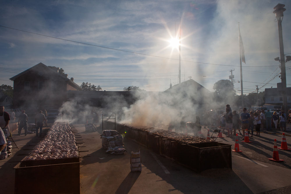 Smoke billows from the grilling area. (Credit: Katharine Schroeder)