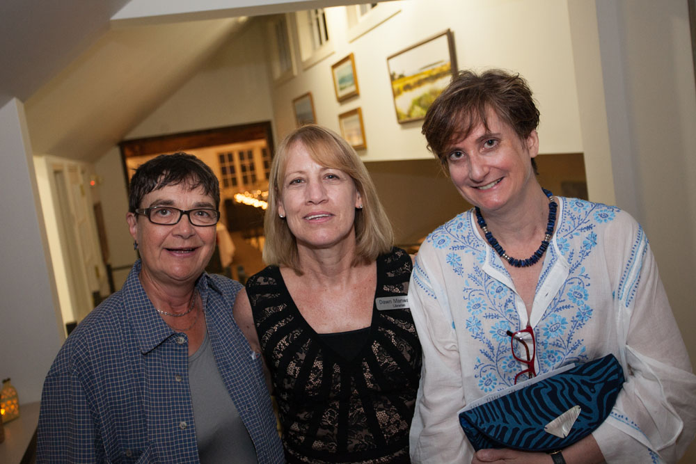 From left:  Board member Paula Hepner, librarian Dawn Manwaring, and Alix Ninfo, vice president of the Board of Trustees. (Credit: Katharine Schroeder)