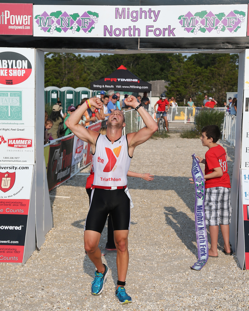 Tim Steiskal of Brookhaven was the winner of the Mighty North Fork Triathlon with a time of 46:36. The event was held at Cedar Beach in Southold Sunday. (Credit: Daniel De Mato)