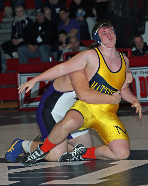 Stephen Ostrowski of Mattituck was defeated by Port Jeffersons Kyle Fiske in the 285 lbs weight class. The Suffolk County Division II wrestling championships were held at  Center Moriches High School on Feb. 15, 2014. (Photo Credit: Daniel De Mato)