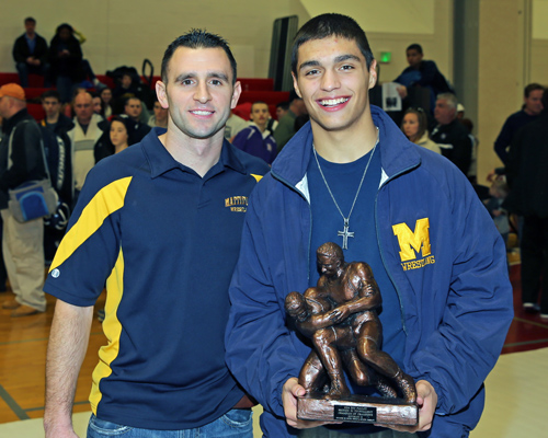 Mattituck Wrestling Coach Cory Dolson with Bobby Becker who was named Champion of Champions in the Suffolk County Division II wrestling championships were held at  Center Moriches High School on Feb. 15, 2014. (Photo credit: Daniel De Mato)