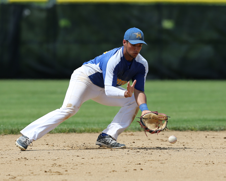 Marcos Perivolaris #17 of Mattituck scoops up a grounder  in the 6th inning. Mattituck defeated Ogdensburg Free Academy 7-2 in the NY State Class B Baseball semi final's at SUNY Broome Community College to advance to the State Championship game on 6-13-15. Daniel De Mato