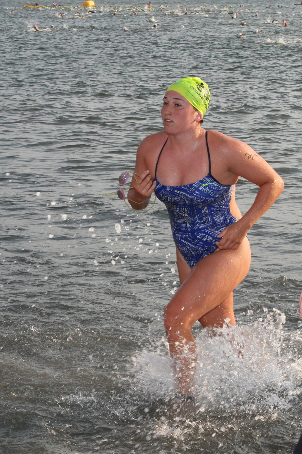 Kelsey Buonaiuto of Miller Place was the first woman out of the water after the swim leg. (Credit: Daniel De Mato)