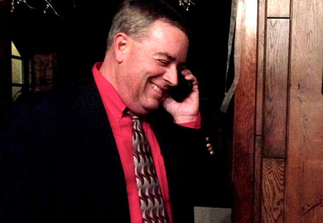 Southold Town Trustee Dave Bergen receives a concession call from opponent Abigail Field. (Credit: Cyndi Murray)