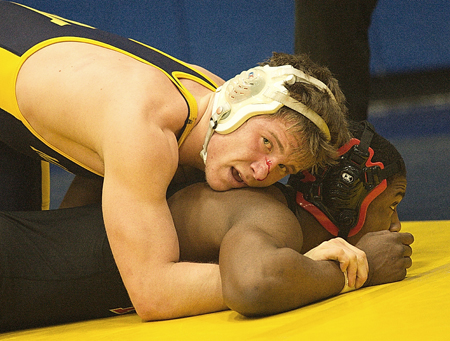 GARRET MEADE PHOTO  |  Tomasz Filipkowski beat Maleik Henry of Hills East in the semifinals last year of the North Fork Invitational en route to his 170-pound title.