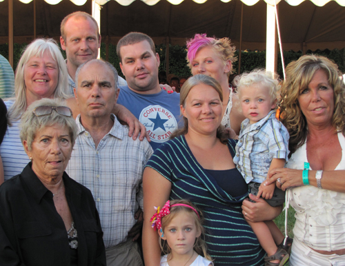 TIM GANNON PHOTO | Frank Locrotondo with his wife, mother, children and grandchildren at a Southold Fire Department fundraiser.