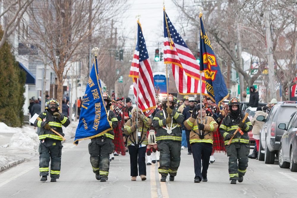 Firefighters march in Saturday's parade in Greenport. (Credit: Katharine Schroeder)