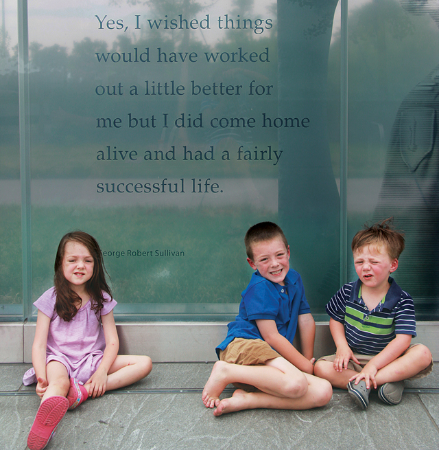 George Sullivan's daughter, Megan Collins, took her three children (from left) Mallaigh, 4, Kevin, 7, and Ryan, 3, to Washington, D.C. to see their grandfather's quote. (Credit: Courtesy photo)