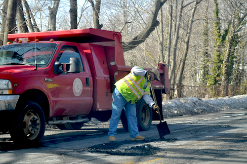 Southold highway department crews helped the village patch potholes on Main Street last winter. (Cyndi Murray photo)