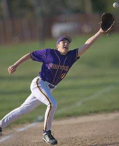 GARRET MEADE FILE PHOTO | Matt Drinkwater, lunging for a ball while playing third base last year, is a returning starter for Greenport.