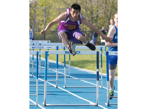 Greenport/Southold's Oscar Coc-Tomas came in first place in the 110-meter high hurdles in 20.1 seconds, a personal record. (Credit: Katharine Schroeder)