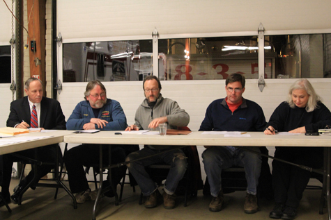 Joseph Prokop (pictured on the far left) will continue to provide legal advice to the village. (file photo)