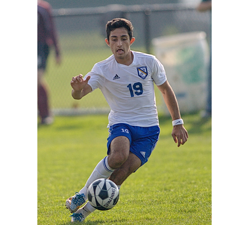 Mattituck's Kaan Ilgin, pictured in the team's game against Southampton, scored two goals in Tuesday's win over Wheatley in the Class B Long Island title game. (Credit: Garret Meade)