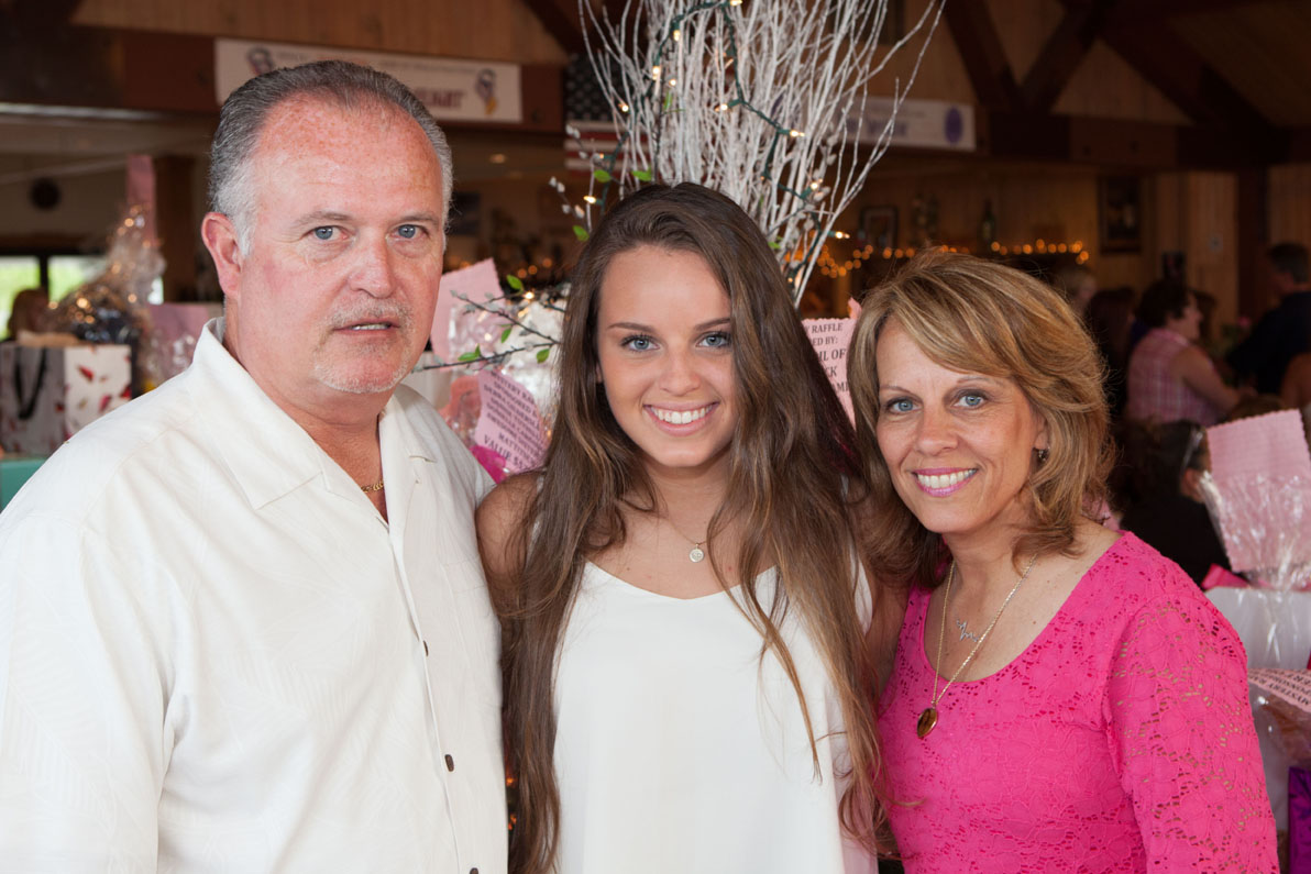 Kait's family: her father Joseph, sister Carly and mother Daria. (Credit: Katharine Schroeder)