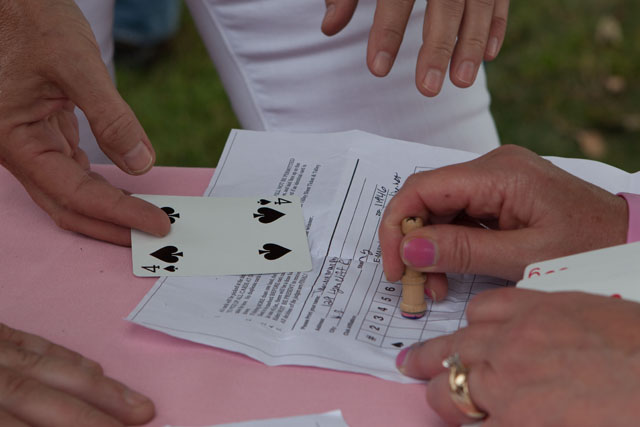 A participant gets his last card stamped on his game sheet. (Credit: Katharine Schroeder)
