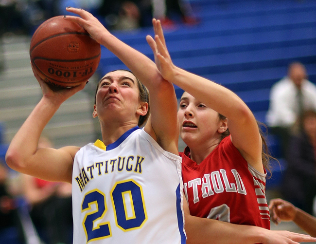 Mattituck's Katie Hoeg, pictured against Southold Monday, scored eight points in the league opening win against Southampton Thursday night. (Credit:  Garret Meade)