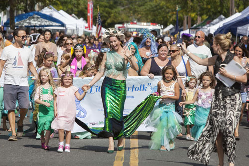 KATHARINE SCHROEDER PHOTO | Contestants in the Little Merfolk Contest participate in the parade at the Greenport Maritime Festival Saturday.