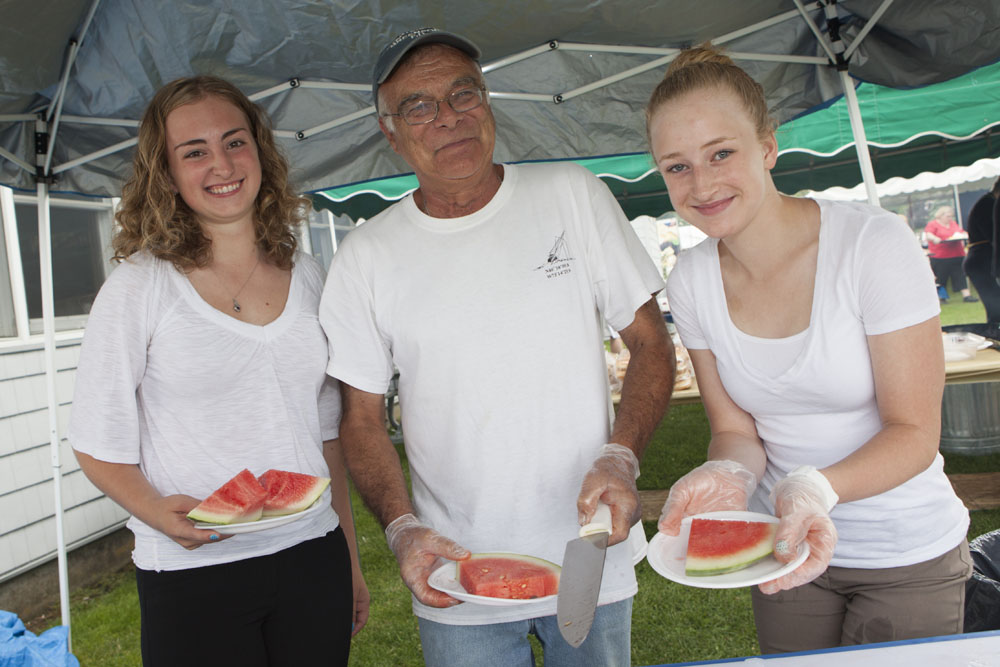 Watermelon fans (from left) Shelby Pickerell, Bob Jester, and Meg Pickerell.