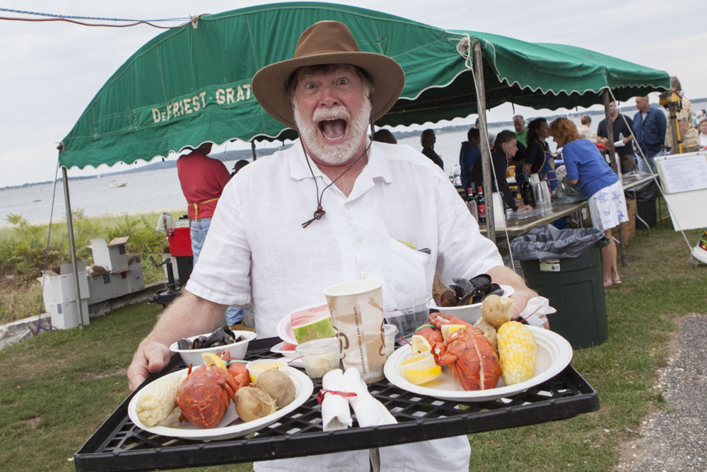 Greg Swords, who is visiting from Georgia, having a good time at Saturday's lobsterfest in Southold. (Credit: Katharine Schroeder photos)