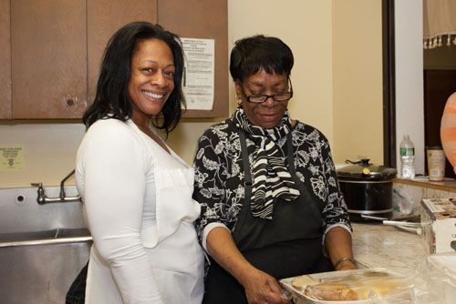 Geraldine Carter, right, with her daughter, Angie Smith, in the kitchen.