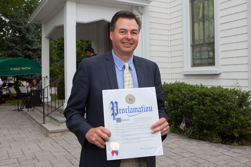 County lawmaker Al Krupski with one of many proclamations handed out during the event.