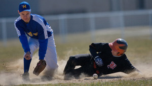 GARRET MEADE PHOTO | Babylon's Nick Giampietro advancing a base while Mattituck's Austin Pase looks for the ball.