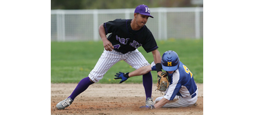Joe Tardif's penchant for stealing bases is tough on his pants. Port Jefferson/Knox shortstop Andy Vasquez could not prevent the Mattituck sophomore from bagging one of his three steals on Friday.