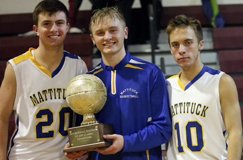 From left, Chris Dwyer, Will Gildersleeve and Joe Tardif with Mattituck's newly won prize. (Credit: Garret Meade)