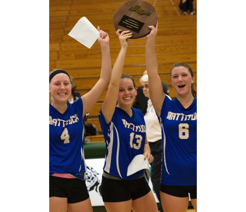 Mattituck's three captains, from left, Colby Prokop, Carly Doorhy and Emilie Reimer picked up the Long Island Class C championship plaque, the Tuckers' fourth in five years. (Credit: Garret Meade)