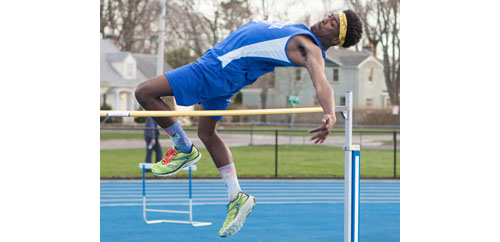 Mattituck junior Darius Brew took first place in the high jump with a height of 6 feet during Thursday's dual meet against Wyandanch. (Credit: Katharine Schroeder)