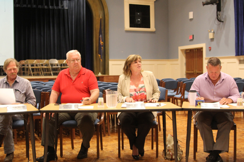 From left, Doug Cooper, Jeff Smith, Laura Jens-Smith and Jerry Diffley. Ms. Jens-Smith was elected president at Thursday's Mattituck school board meeting. (Credit: Jen Nuzzo)