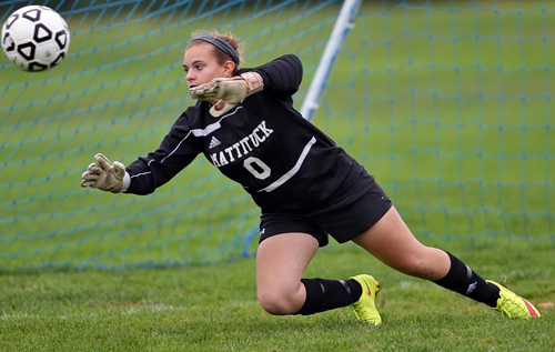 Mattituck goalkeeper Emma Fasolino stretches for a Port Jefferson shot that missed the mark in the first half. (Credit: Garret Meade)