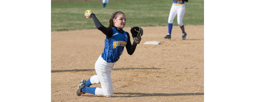 Mattituck shortstop Ashley Chew makes a throw from her knee during Tuesday's game in Center Moriches. (Credit: Katharine Schroeder)